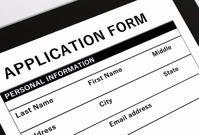 Federal investigator codnucting a security clearance background investigation interview